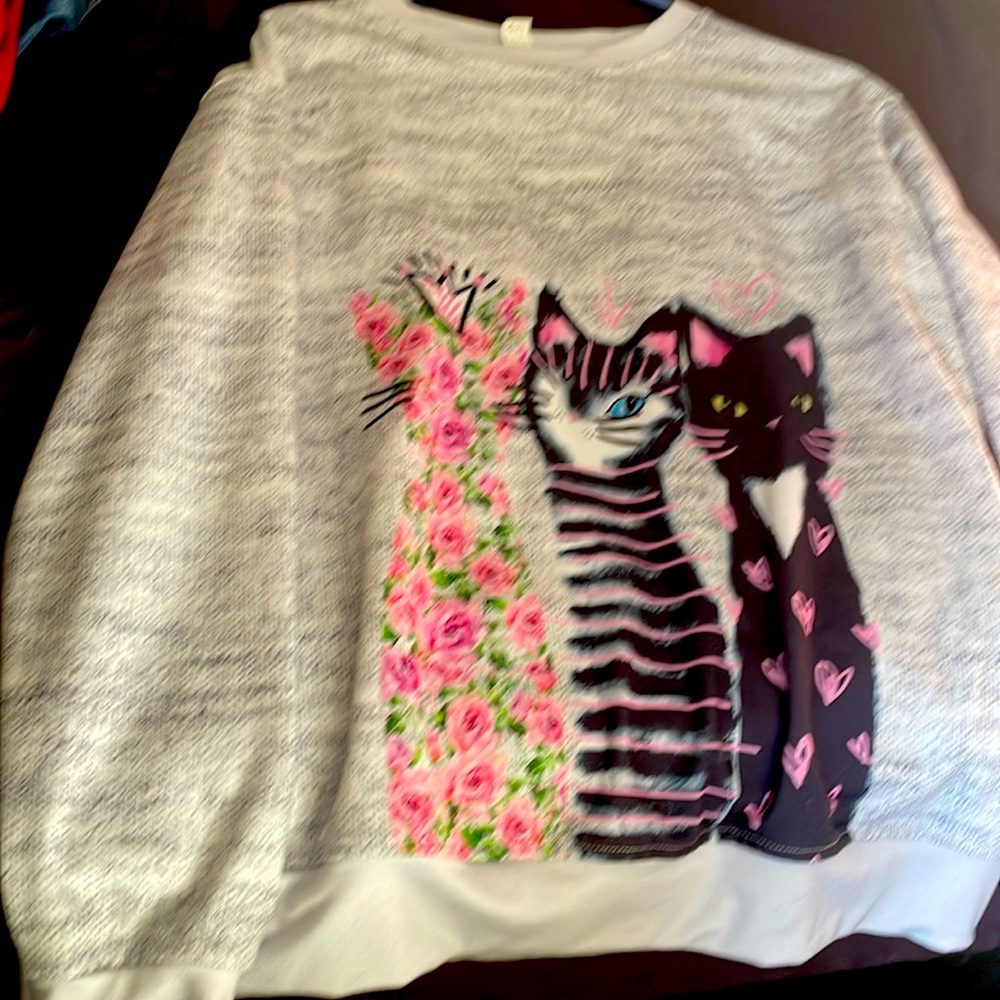 Women sweatshirt, size medium, thin, but soft.